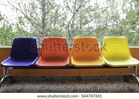 colorful of chairs on tree background