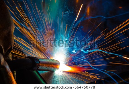 welder, craftsman, erecting technical steel Industrial steel welder in factory technical, Royalty-Free Stock Photo #564750778
