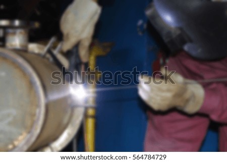 Picture blur welder working