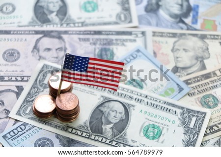 US flag sign and Dollar cash banknote and coin background, USA finance and economy concept