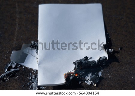 a charred piece of paper