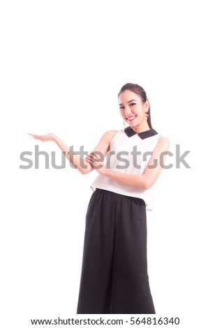 Portrait of business young female with a radiant smile, woman with showing open palm presenting something ,isolated on white in studio 