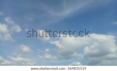 blue sky background with tiny clouds  