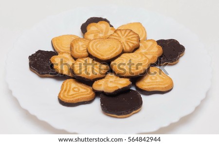 Chocolate chip cookies on a white plate