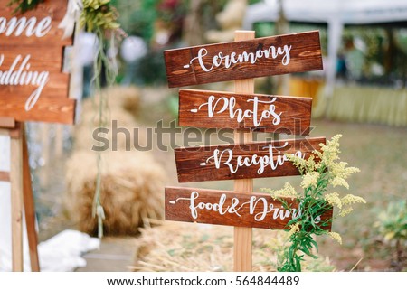 wooden sign in wedding ceremony