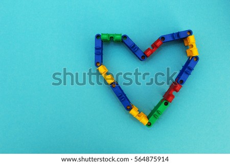 Heart on a blue background of the a constructor cubes