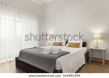 Brightly and Fresh Bedroom Suite Royalty-Free Stock Photo #564885484