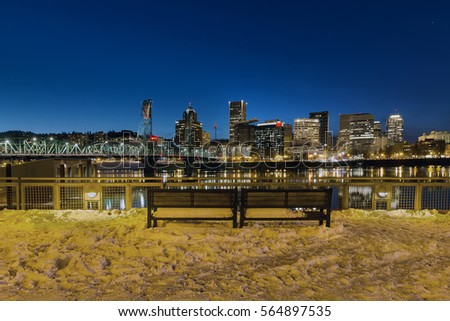 Portland Skyline View from Eastbank Esplanade during evening blue hour on a cold winter night