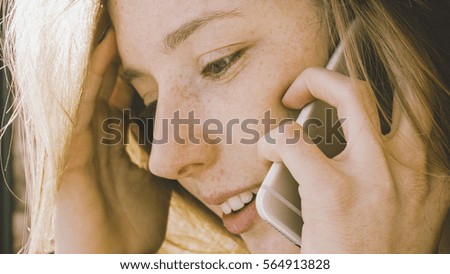 communicating on the phone girl. A positive attitude on the phone.