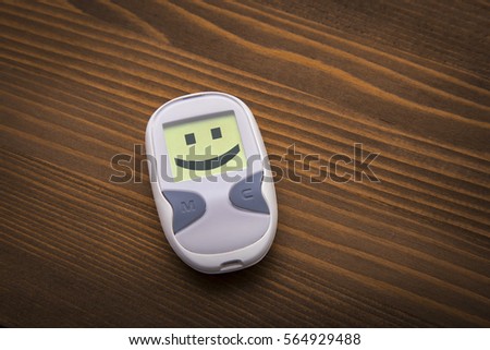 List of positive health habits that fight diabetes surrounding glucometer with happy face icon illustrating good health