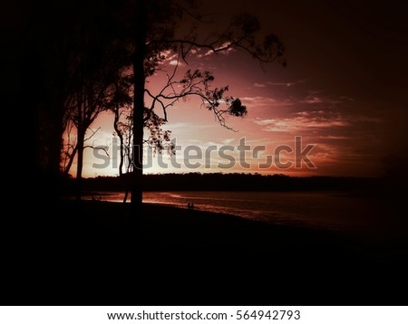 An artistically manipulated photograph of Lake Samsonvale as the sun is setting in Brisbane, Australia. 