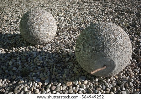 concrete balls,granite,park,object,heavy,rock,circle,gray,park,round,outdoor,