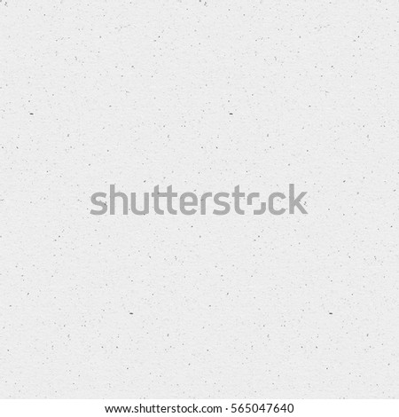 Seamless white with black speckles texture kraft paper high quality. Ideal for printing to the web. Royalty-Free Stock Photo #565047640