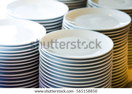 Clean, White dishes on table 