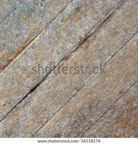 Dirty weather-beaten surface of the wooden wall