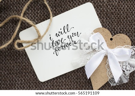 Mockup with decoreted heart and card with quote I will love you forever for valentine's day