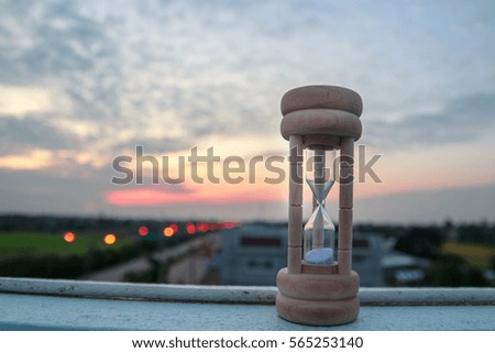 hourglass on the twilight sky
