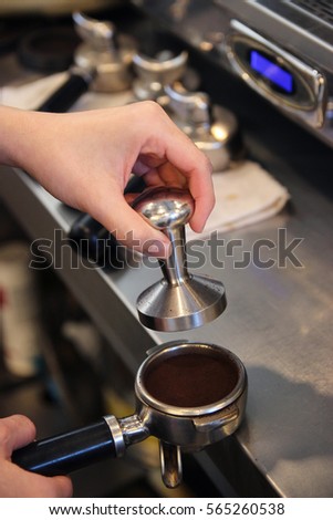 Coffee temp by woman hand