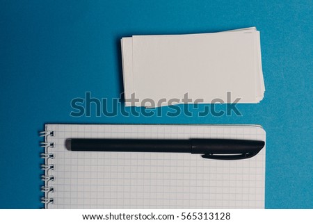Notebook and pen on a bright background