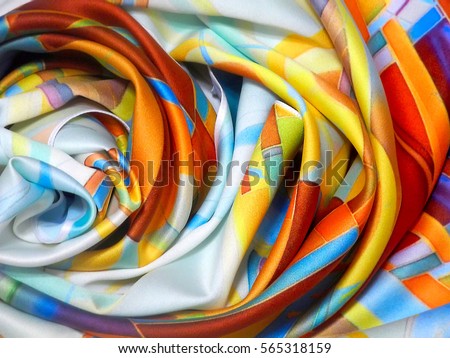 Photo silk fabric. Silk scarf with bright abstract print. Textile Design. Painting fabric, silk painting in batik  
