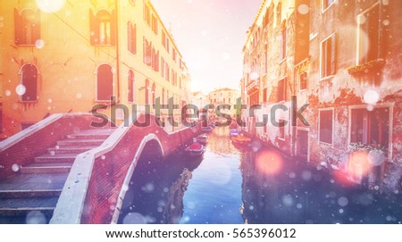 Canal with gondolas in Venice, Italy. Photo greeting card. Bokeh light effect, soft filter. 