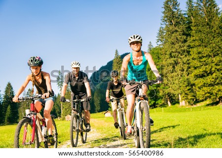 Family Of Four Cycling
