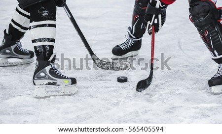 close-up with the puck during the game Royalty-Free Stock Photo #565405594
