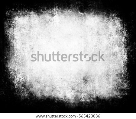 Grunge scratched texture background with central area for your text or picture.