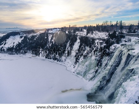 aerial picture of waterfall at sunset in quebec
