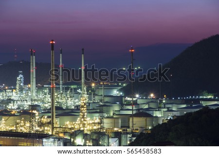 Oil refinery industry at twilight sunset Background.