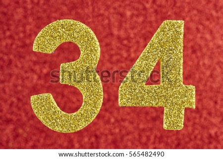 Number thirty-four yellow color over a red background. Anniversary. 