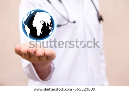 Health care And Cardiologist . with blur doctor use stethoscope holding earth icon