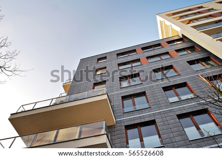Modern apartment building Royalty-Free Stock Photo #565526608