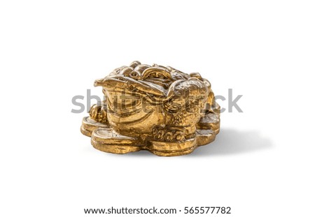 Cash mascot - Chan Chu - a gold frog figurine sitting on coins.isolated on white background with clipping path.