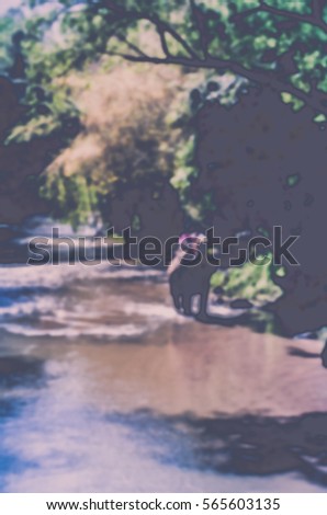 Blurred abstract background of Tourists ride elephant in the forest