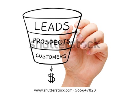 Hand drawing sales funnel business concept with black marker on transparent glass board. Royalty-Free Stock Photo #565647823