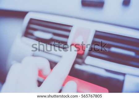Picture blurred  for background abstract and can be illustration to article of hand press emergency light button