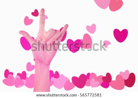 Hand sign I love you on pink hearts background.