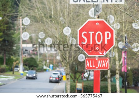 Stop sign by the side of the road