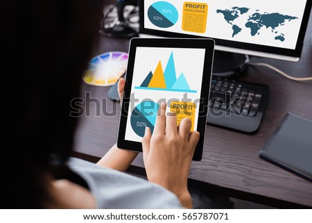 Composite image of business presentation against woman watching her tablet computer