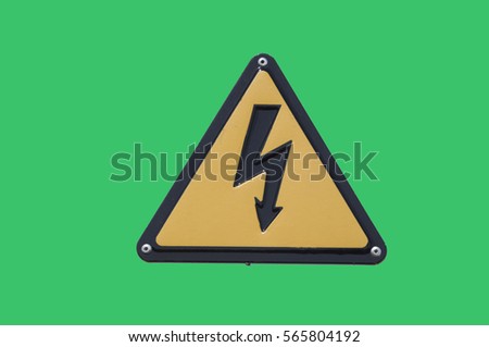 warning sign "high voltage" on a green background