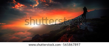 silhouette man standing on the peak of the mountains,  colorful foggy summer sunrise, Europe  mountains, Alps ,  photo exclusive on Shutterstock, wallpaper  background landscape 
