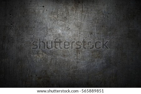 Grey grunge metal textured wall background Royalty-Free Stock Photo #565889851