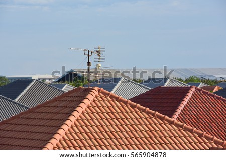 radio antenna on the roof of europe house Royalty-Free Stock Photo #565904878