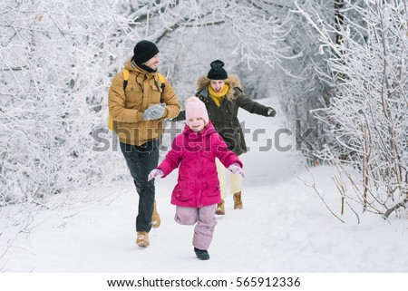 family spends time together in the winter
