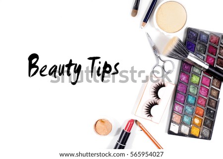BEAUTY TIPS text on white background with surrounded by makeup accessories
