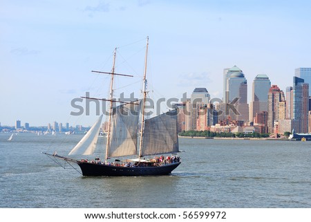 New York City Manhattan skyline with skyscrapers and sailing boat