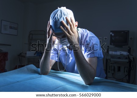 Doctor Is Holding His Head Desperatly