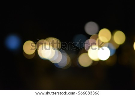 Out of focus of many color of lights in the cold night at the city,blurred light,abstract background,street light,colorful light,blurred vision background.