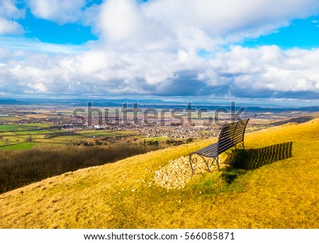 A walk up Cleeve Hill near Cheltenham in Gloucestshire, with Cleeve Hill being the highest point in the Cotwolds Royalty-Free Stock Photo #566085871